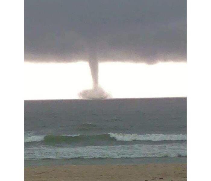 An Impressive Water Spout Ready to come ashore